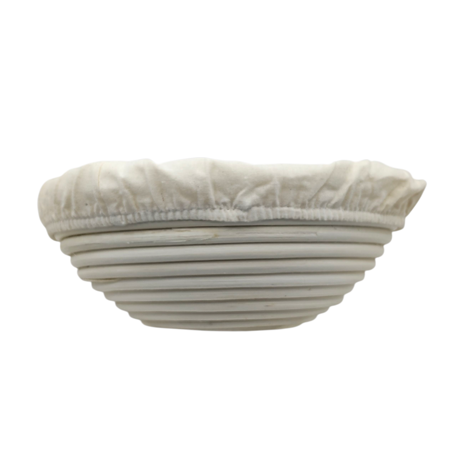 22cm round banneton with cloth liner for baking sourdough made from food-safe natural rattan on white background