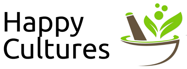 'Happy Cultures' in text next to a bowl and fresh green leaves, representing organic products and natural fermentation.