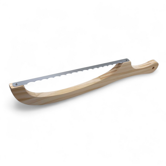Wooden serrated bread bow knife sitting upside down with shadow on white background