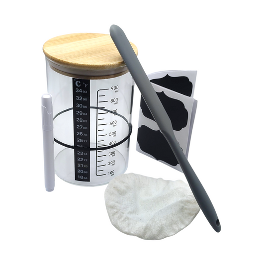 Sourdough starter jar kit containing a 900ml wide mouth clear glass jar with thermometer strip and wooden lid, plus spatula, cloth lid, label sheet, and pen