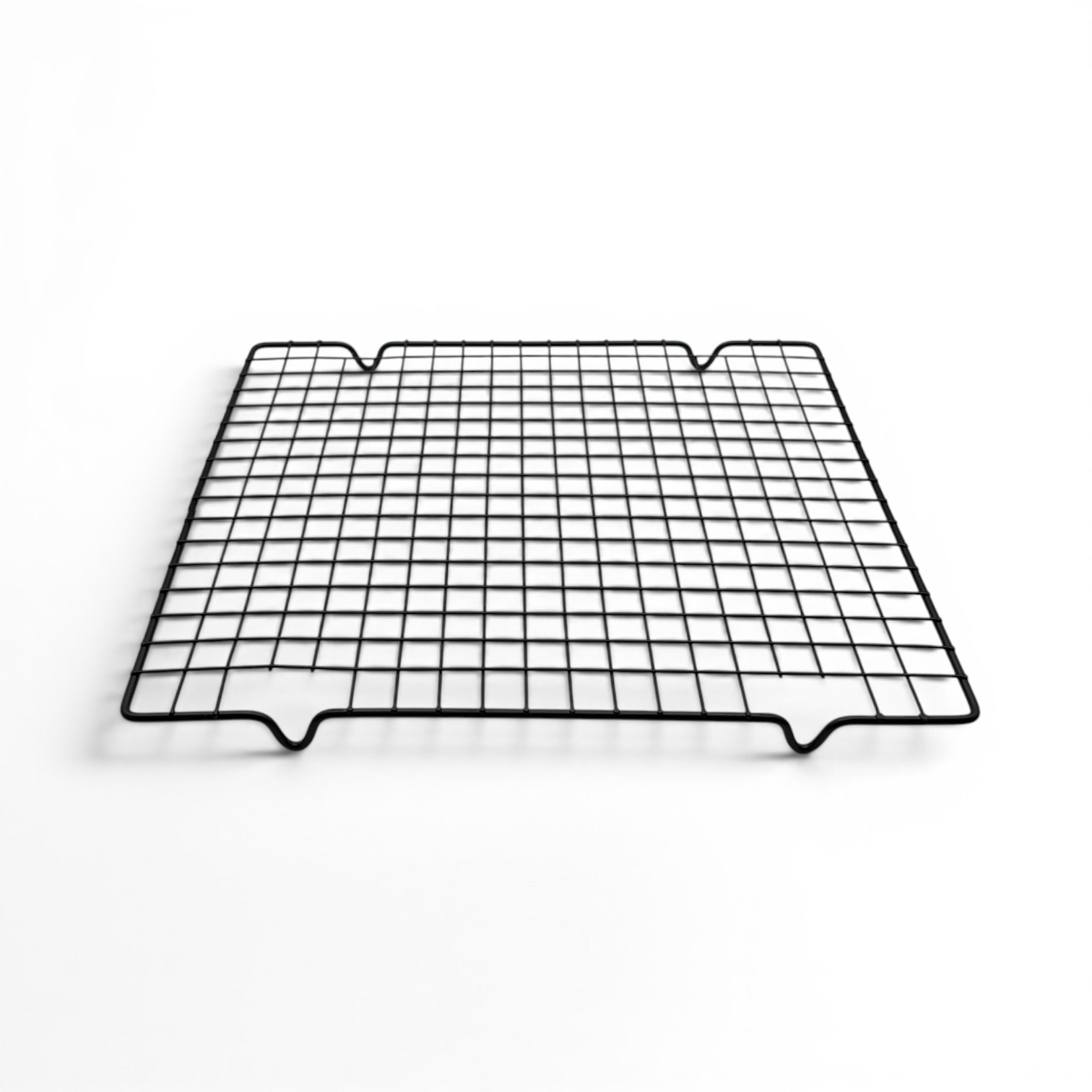 Metal cooling rack with grid pattern on a white background