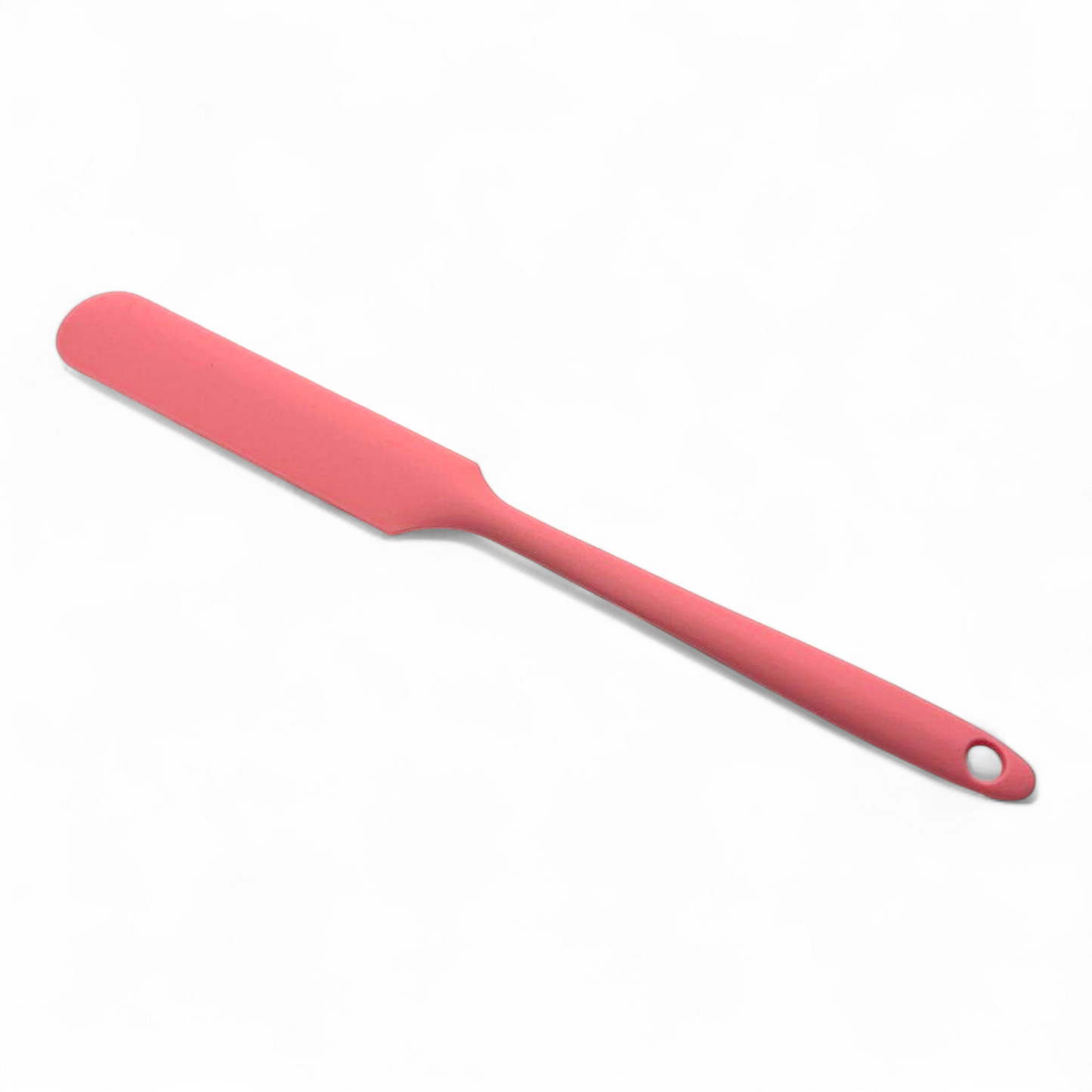 Pink silicone spatula on a white background