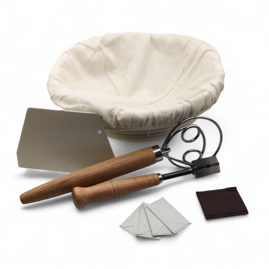Sourdough baking kit with Danish dough whisk, wooden bread lame with spare blades and leather cover, 22cm round banneton with cloth liner, and plastic scraper
